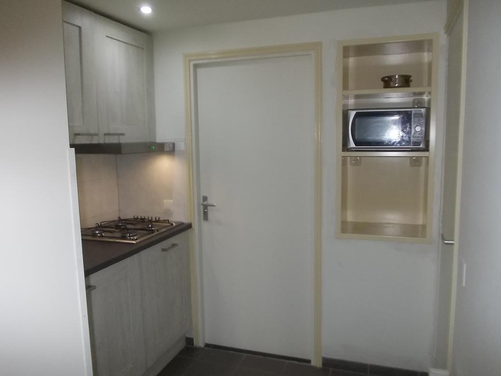 Apartment + Studios Insulinde Тілбург Номер фото